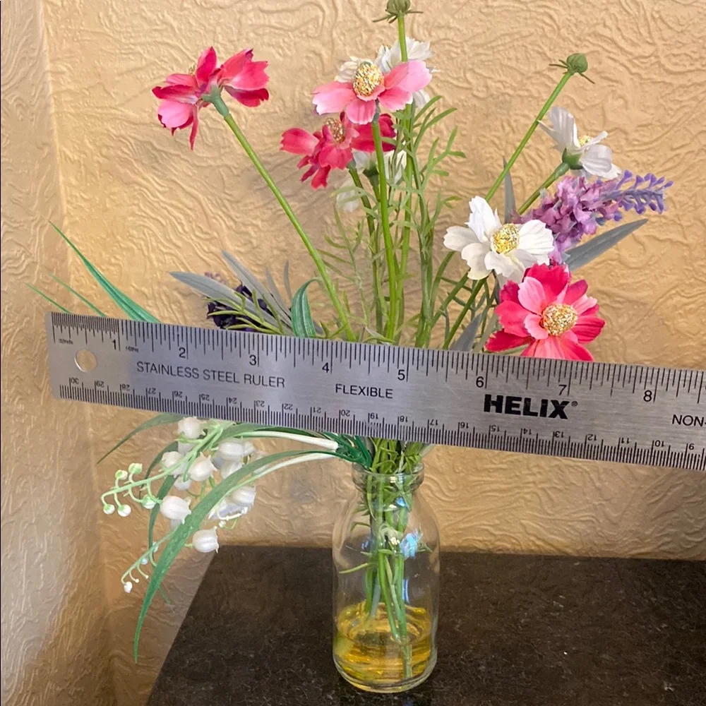 Floral Arrangement in Glass Vase 12” tall.